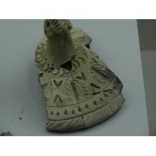 Clay lid with mandorla, arrows, sun rays and symbols